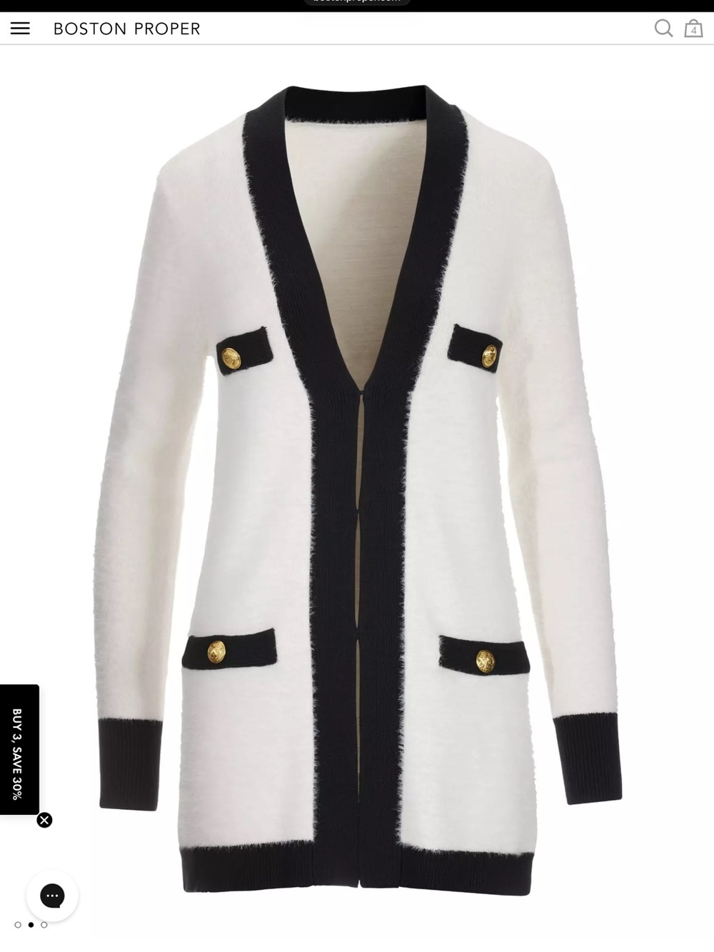 Boston proper off white w black trim cardigan.
Beautiful sweater and versatile.